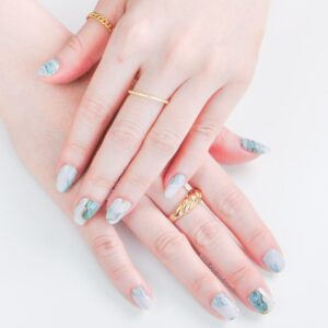 polish nail wraps with green marble designs