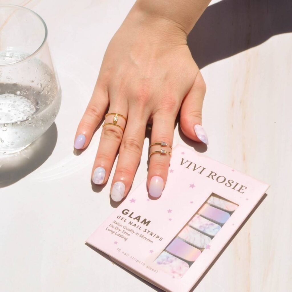 polish nail wraps with mix of pink purple marble design